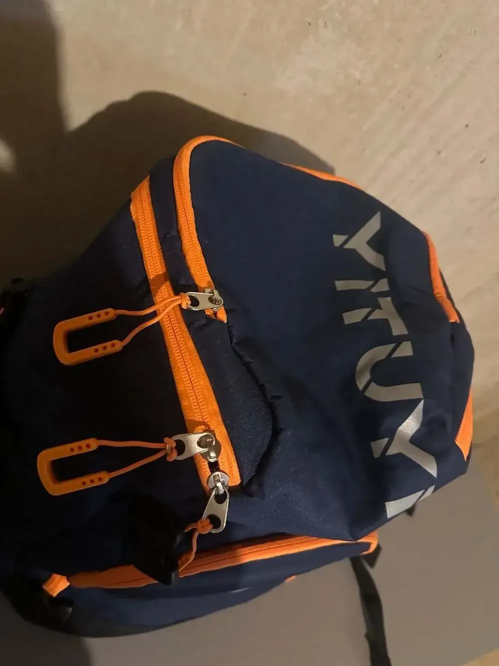 Yituyisi Navy Blue and Orange Multi-Pocket Backpack with Padded Straps